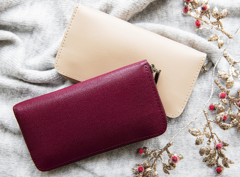 Red and beige leather wallets
