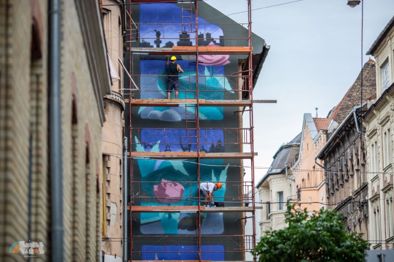 Hogy kerülnek lengyel művészek falfestményei budapesti tűzfalakra?